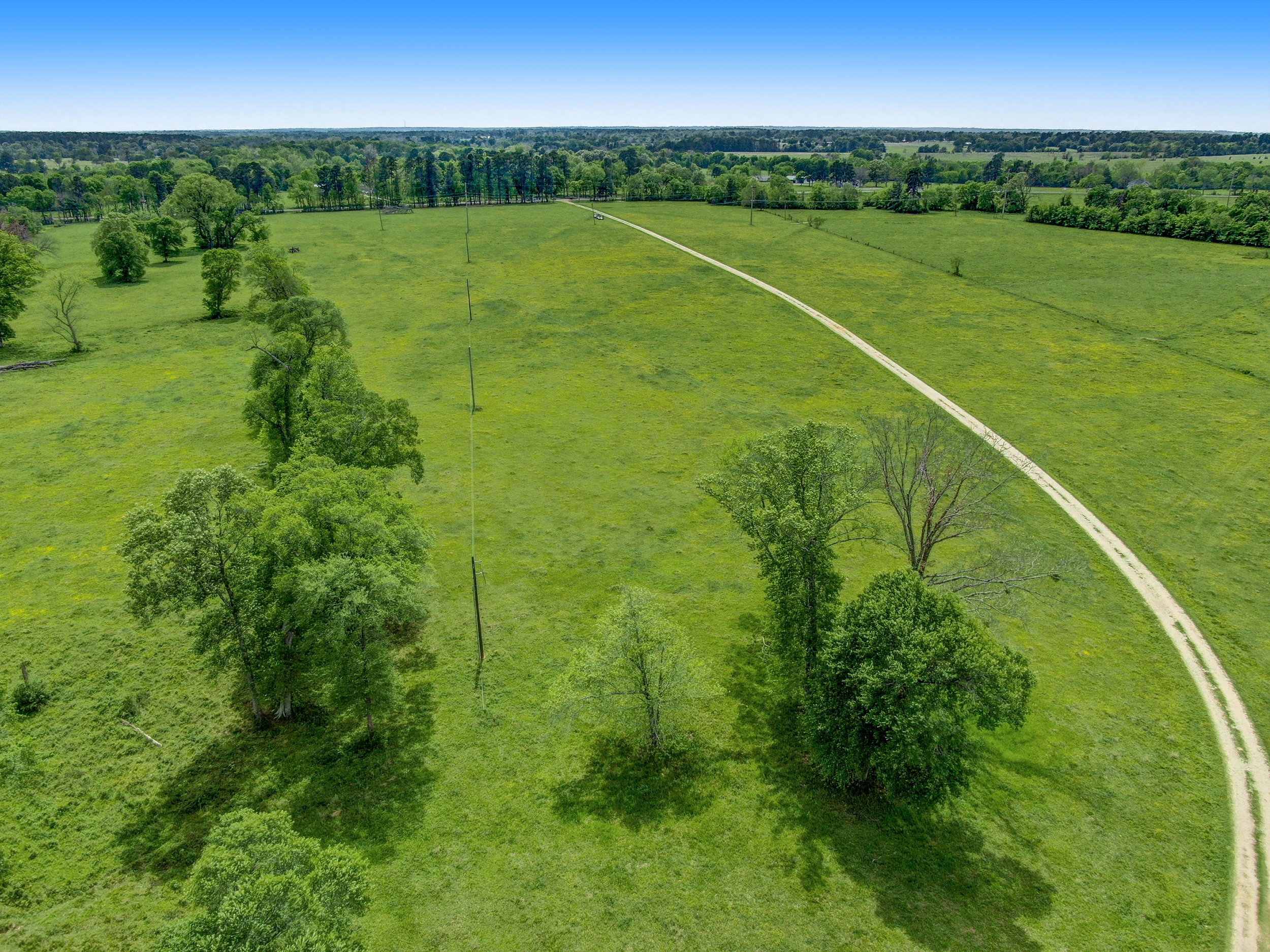 The Manors at New Waverly - Scenic Acreage Grounds & Topography